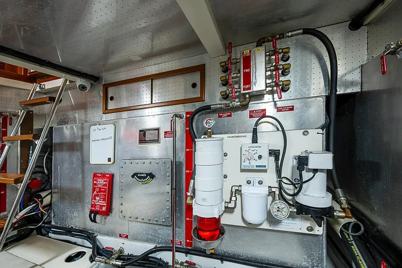 Slide: The Image of Engine room of 2008 Krogen 48 North Sea yacht, featuring control panels and equipment. - 63