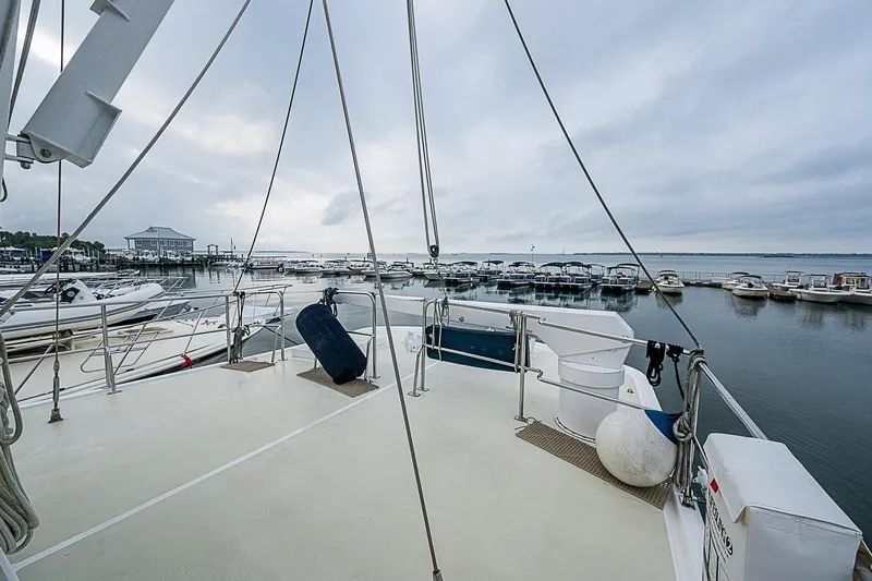 Slide: The Image of Deck view of 2008 Krogen 48 North Sea yacht docked at marina. - 51
