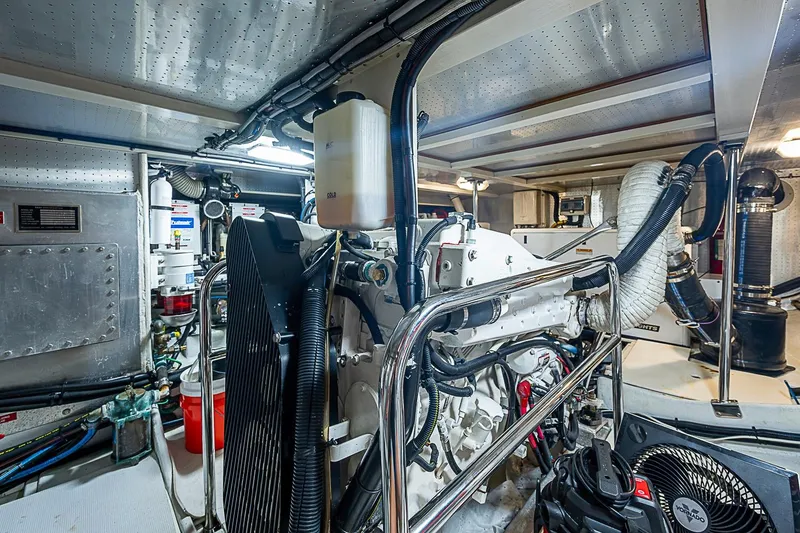 Slide: The Image of Engine room of 2008 Krogen 48 North Sea yacht, showcasing mechanical components and systems. - 59