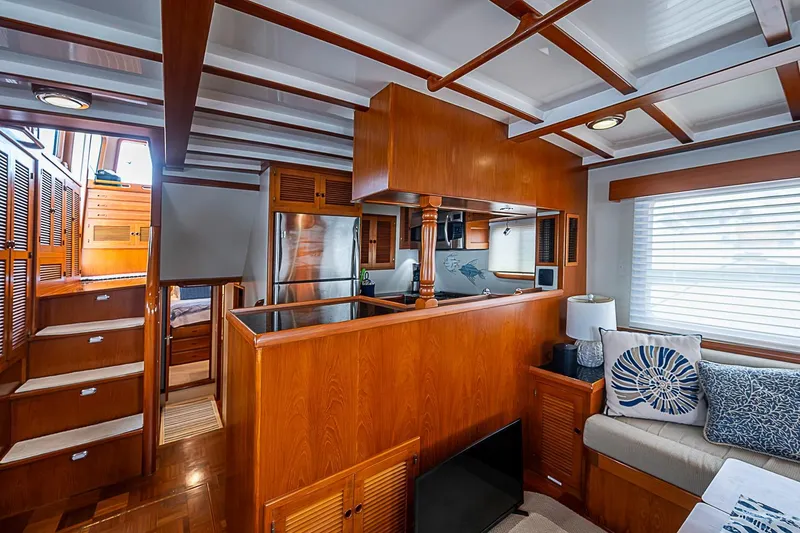 Slide: The Image of Luxurious 2008 Krogen 48 North Sea yacht interior with wood finishes and modern amenities. - 19