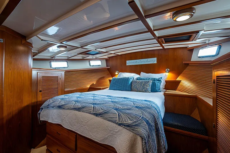 Slide: The Image of Luxurious cabin interior of 2008 Krogen 48 North Sea yacht with cozy bedding. - 28