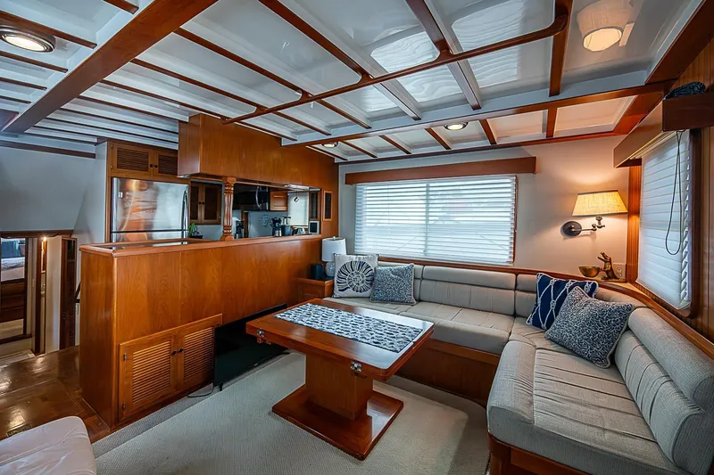 Slide: The Image of Luxurious interior of 2008 Krogen 48 North Sea yacht with elegant wood finishes and cozy seating. - 15