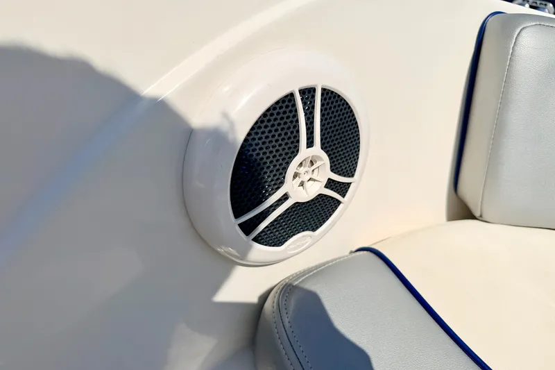Slide: The Image of Speaker and seat detail on 2008 Sea Ray 195 Sport boat interior. - 59