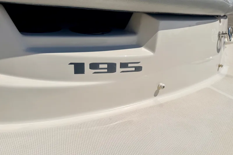 Slide: The Image of Close-up of 2008 Sea Ray 195 Sport boat model number on hull. - 21