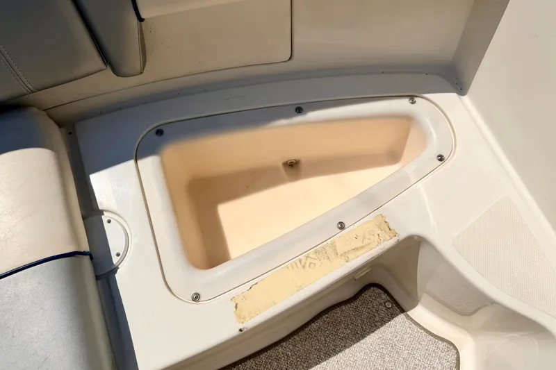 Slide: The Image of Storage compartment in 2008 Sea Ray 195 Sport boat interior. - 36