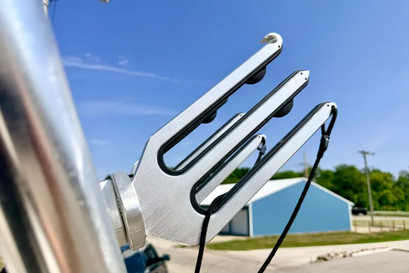 Slide: The Image of Wakeboard rack on a 2008 Sea Ray 195 Sport boat under clear blue sky. - 66