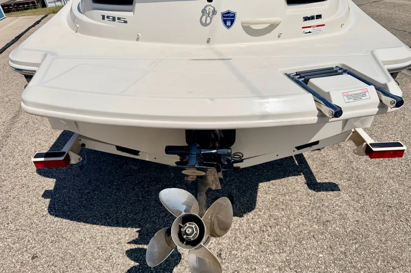 Slide: The Image of Rear view of a 2008 Sea Ray 195 Sport boat with propeller and swim platform. - 16