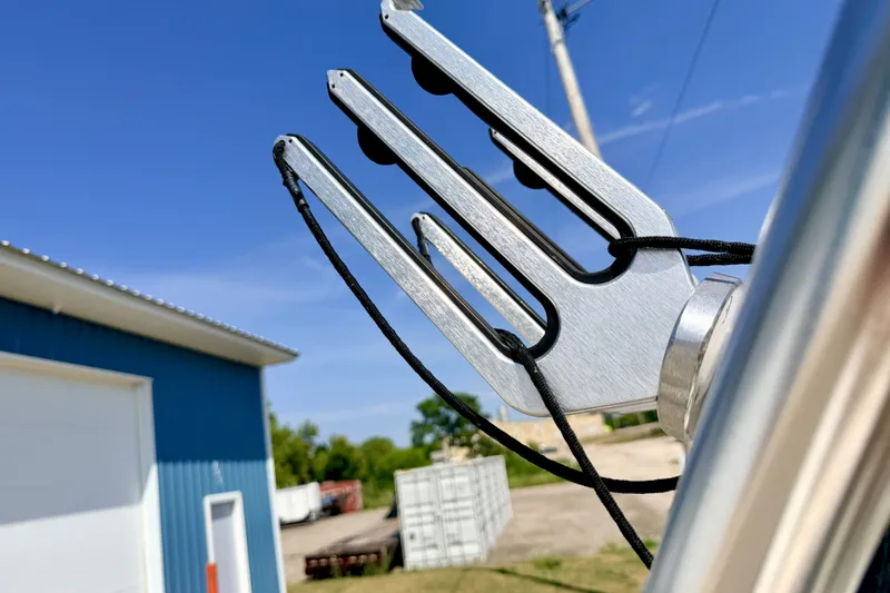 Slide: The Image of Close-up of a 2008 Sea Ray 195 Sport boat accessory against a clear blue sky. - 67