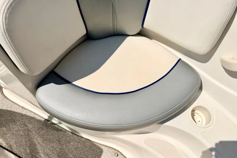 Slide: The Image of 2008 Sea Ray 195 Sport boat seat with beige and gray upholstery. - 62