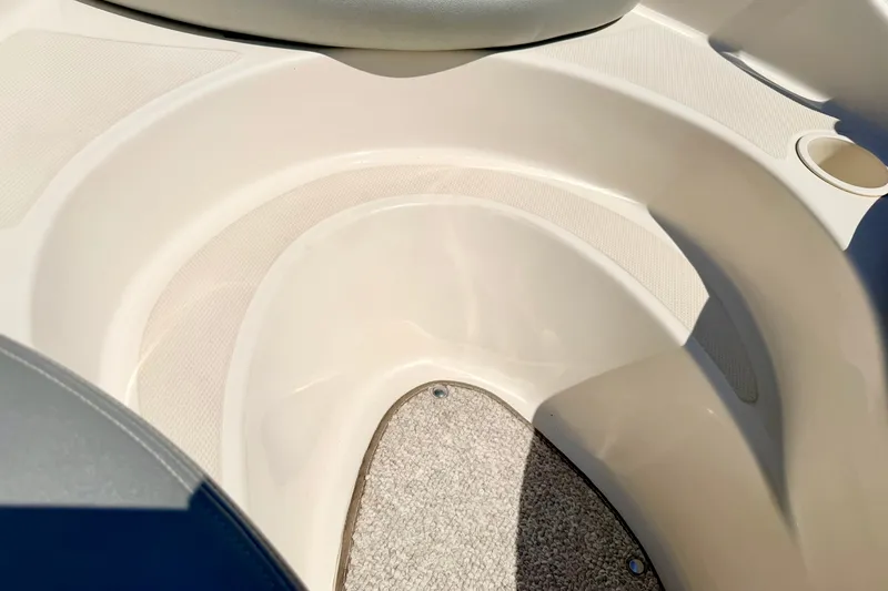 Slide: The Image of Interior view of a 2008 Sea Ray 195 Sport boat, featuring seating and flooring. - 64