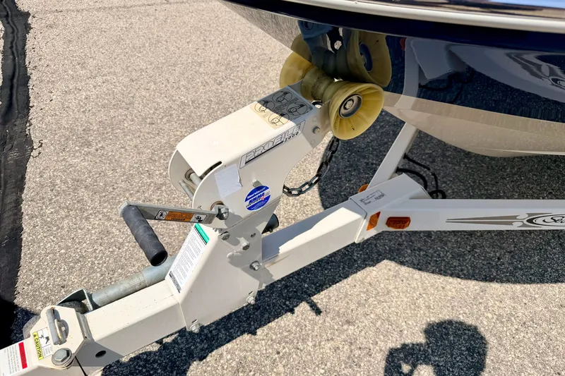 Slide: The Image of Trailer hitch of a 2008 Sea Ray 195 Sport boat on pavement. - 72