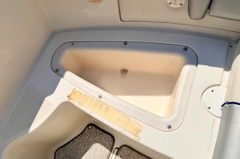 Slide: The Image of Storage compartment in 2008 Sea Ray 195 Sport boat interior. - 34
