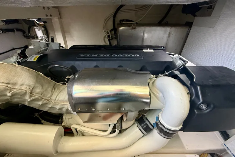 Slide: The Image of Engine compartment of a 2015 Tiara Yachts 50 Coupe with Volvo Penta engine. - 99
