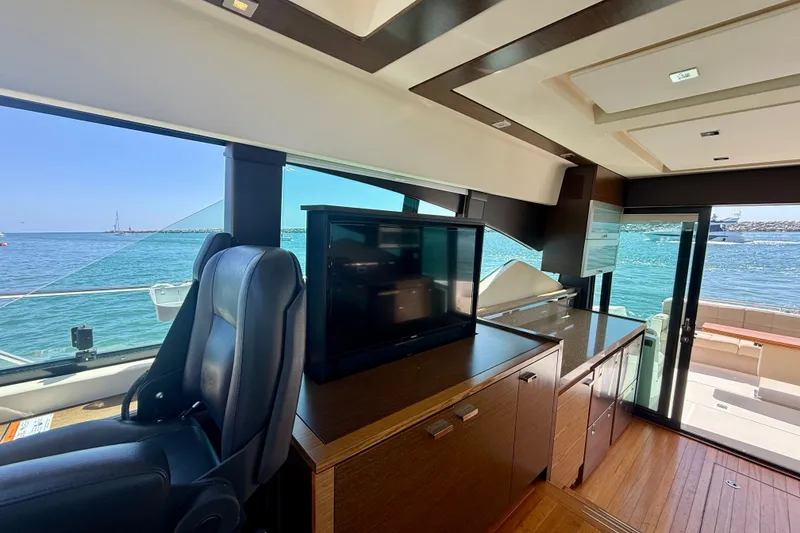 Slide: The Image of Interior of 2015 Tiara Yachts 50 Coupe with ocean view and modern furnishings. - 28
