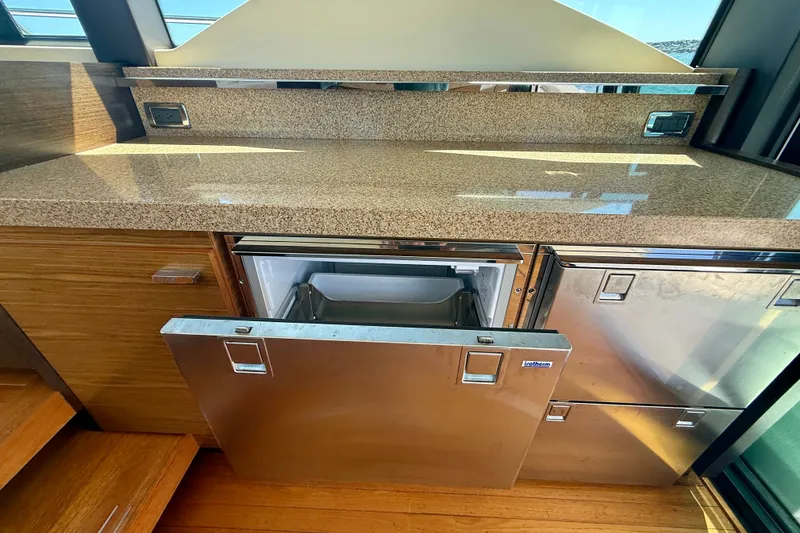 Slide: The Image of Luxury yacht kitchen with open stainless steel fridge, Tiara Yachts 50 Coupe 2015 model. - 32