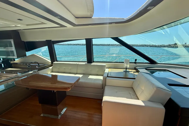 Slide: The Image of Luxurious interior of 2015 Tiara Yachts 50 Coupe with ocean view through large windows. - 16
