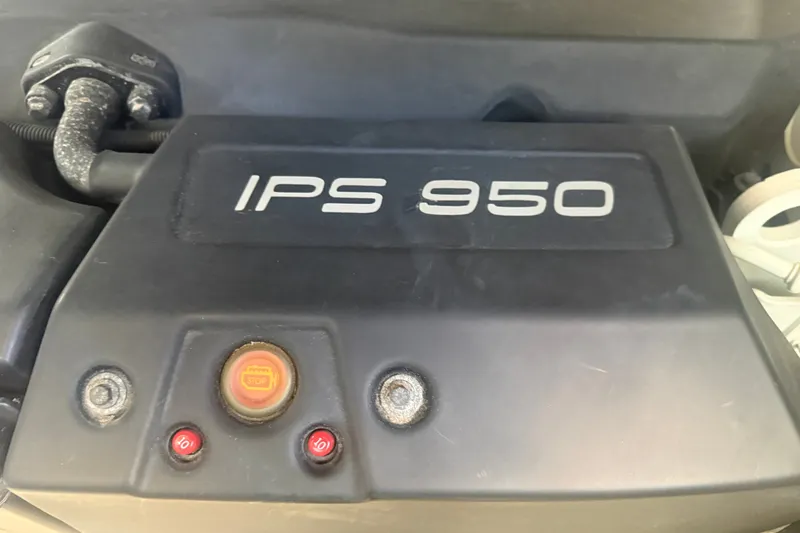 Slide: The Image of Engine compartment of a 2015 Tiara Yachts 50 Coupe featuring IPS 950 system. - 96