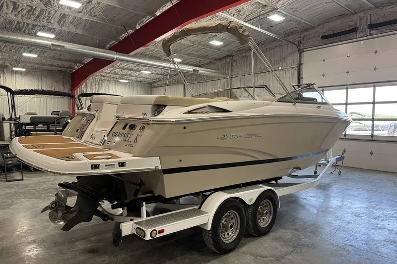 Slide: The Image of 2017 Regal 2700 Bowrider boat on trailer in indoor storage facility. - 4
