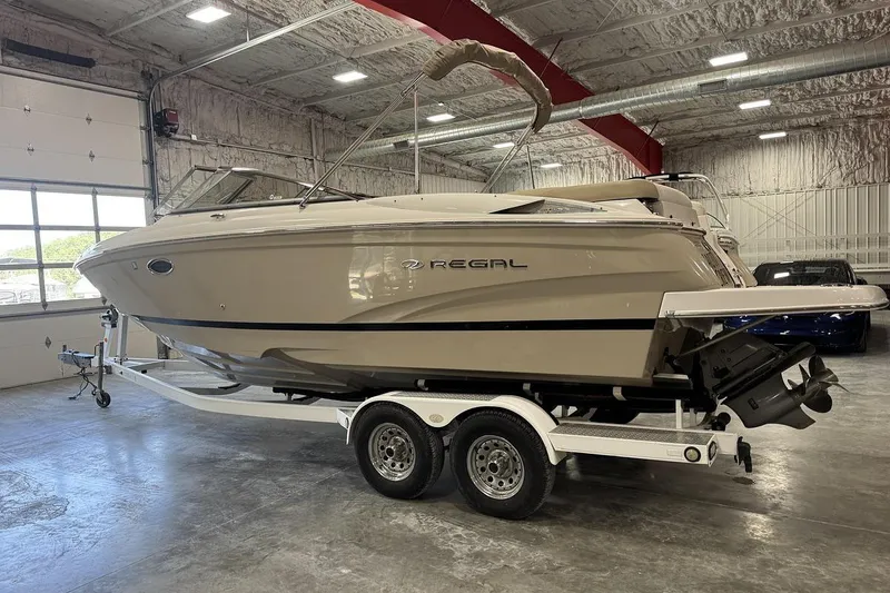Slide: The Image of 2017 Regal 2700 Bowrider boat on trailer in indoor storage facility. - 3