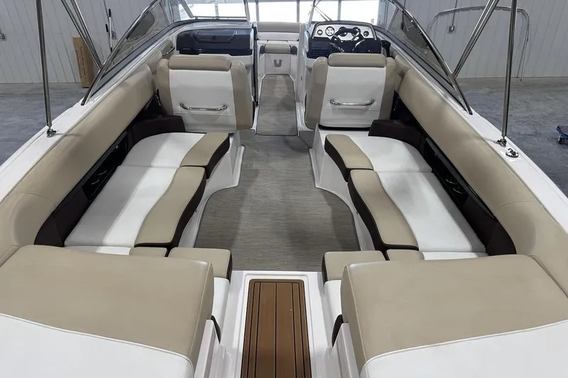 Slide: The Image of 2017 Regal 2700 Bowrider interior with beige seating and sleek design. - 6
