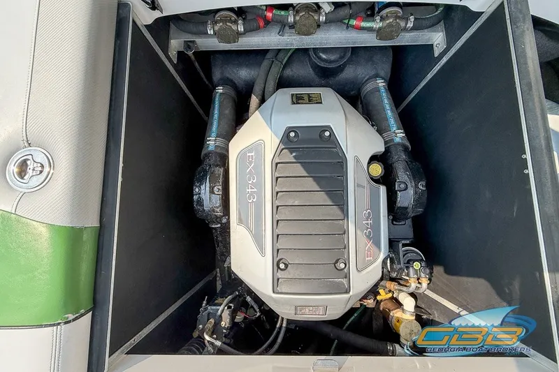 Slide: The Image of Engine compartment of a 2008 Nautique Super Air Nautique 210 boat. - 19