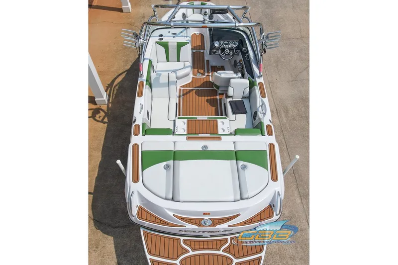Slide: The Image of 2008 Nautique Super Air Nautique 210 boat with green and white interior, top view. - 18