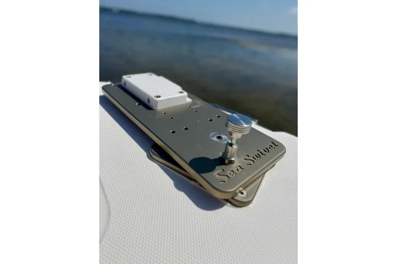 Slide: The Image of Boston Whaler 270 Dauntless 2017 boat accessory, Sea Swivel, on deck by water. - 16