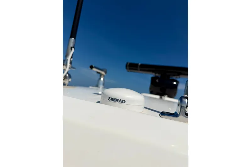 Slide: The Image of 2017 Boston Whaler 270 Dauntless boat with Simrad equipment under clear blue sky. - 22