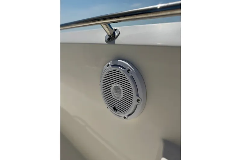 Slide: The Image of Speaker on 2017 Boston Whaler 270 Dauntless boat, stainless steel railing above. - 34
