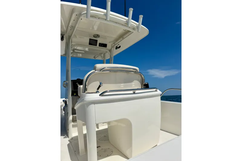 Slide: The Image of 2017 Boston Whaler 270 Dauntless boat console under clear blue sky. - 29