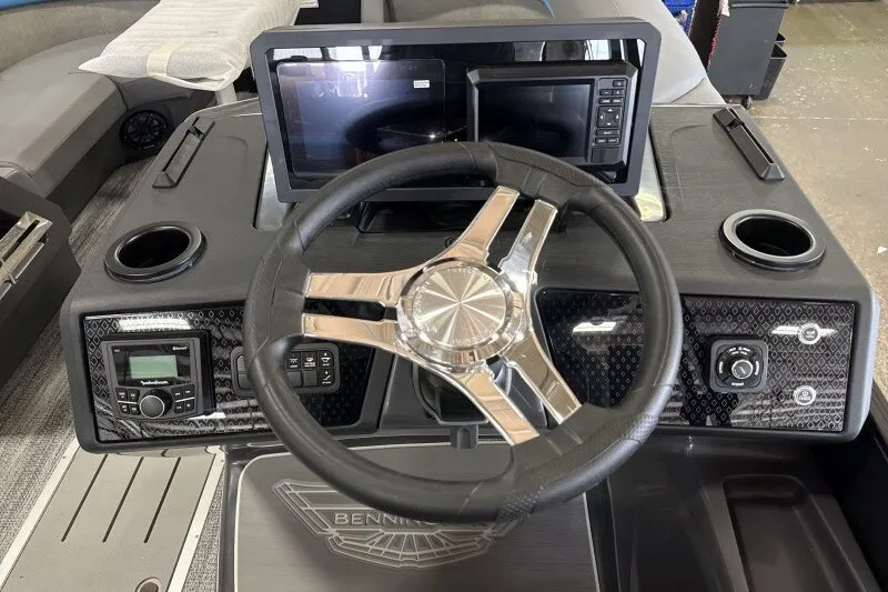 Slide: The Image of Steering console of 2027 Bennington 22 M Swingback with modern controls and displays. - 15