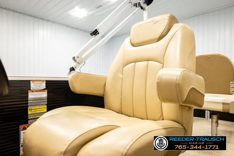 Slide: The Image of Luxurious beige captain's chair in 2018 Bennington SX RF boat interior. - 40