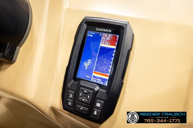 Slide: The Image of Garmin fishfinder on 2018 Bennington SX RF boat dashboard, Reeder-Trausch Marine branding visible. - 38