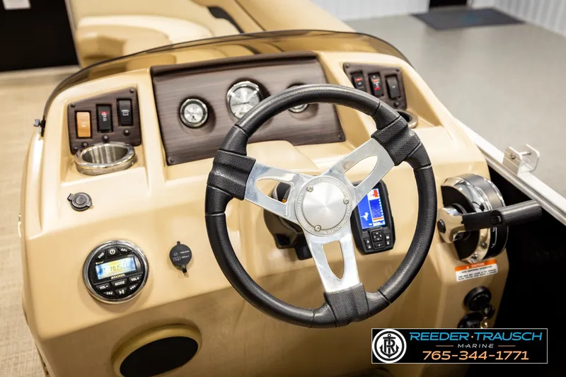 Slide: The Image of 2018 Bennington SX RF boat dashboard with steering wheel and control panel. - 30