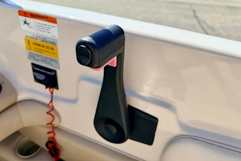 Slide: The Image of Throttle control lever on a 2003 Glastron GX 180 Ski & Fish boat. - 37