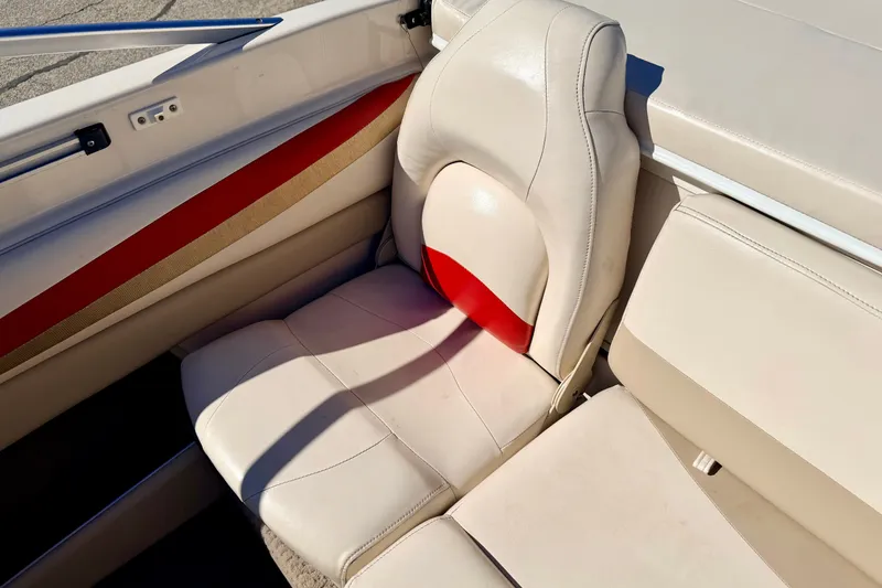 Slide: The Image of 2003 Glastron GX 180 Ski & Fish boat interior with beige and red seating. - 27