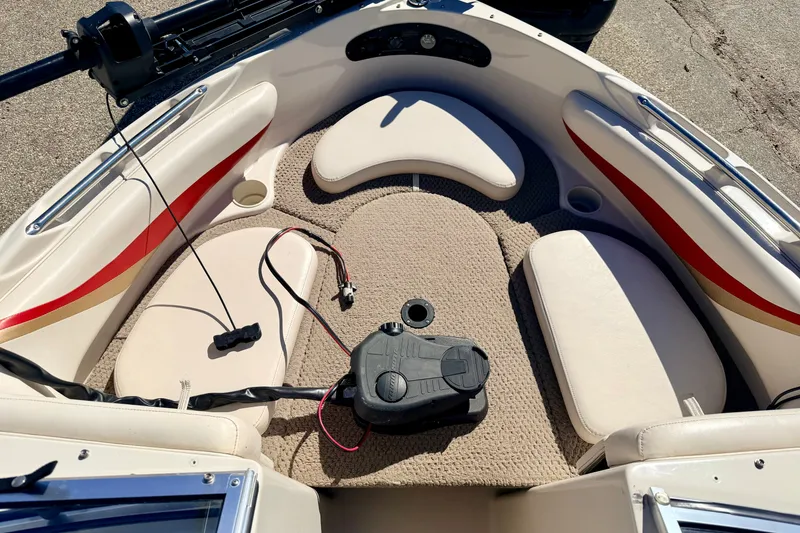 Slide: The Image of 2003 Glastron GX 180 Ski & Fish boat interior with seating and fishing equipment. - 46