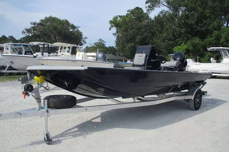 The Image of 2027 Avid 20 Rogue CC boat on trailer, parked outdoors. - 0