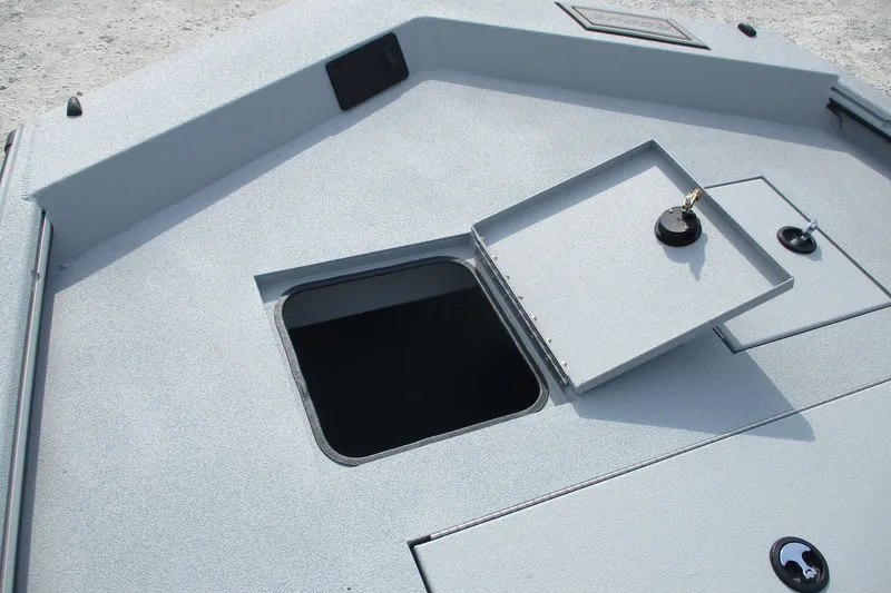 Slide: The Image of Open storage compartment on 2027 Avid 20 Rogue CC boat deck. - 7