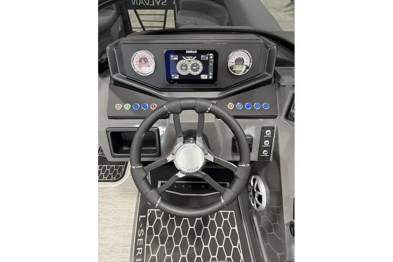 Slide: The Image of Steering console of 2026 Sylvan L-5 Platinum boat with modern controls and display. - 8