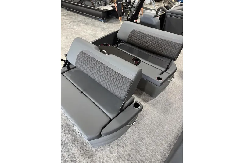 Slide: The Image of 2026 Sylvan L-5 Platnum boat seats with cup holders and textured upholstery. - 5