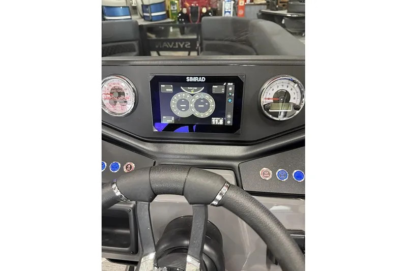 Slide: The Image of Dashboard of 2026 Sylvan L-5 Platinum boat with Simrad display and gauges. - 10