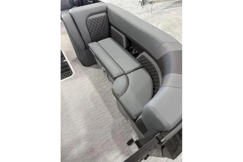 Slide: The Image of Luxurious seating in the 2026 Sylvan L-5 Platinum boat, featuring sleek gray upholstery. - 14