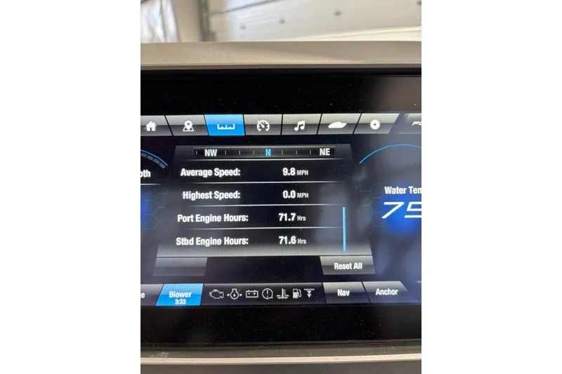Slide: The Image of Dashboard of 2021 Yamaha Boats 252SE showing speed and engine hours. - 14