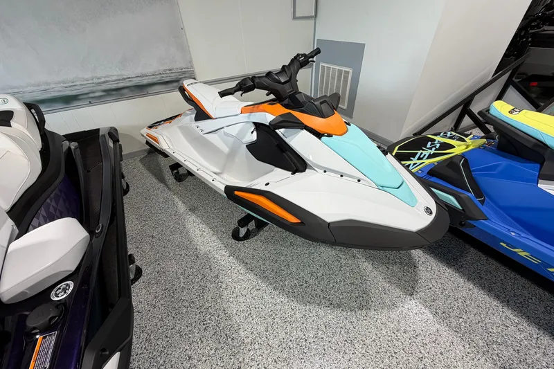 Slide: The Image of 2026 Yamaha WaveRunner JetBlaster LTD in showroom, featuring sleek design and vibrant colors. - 2