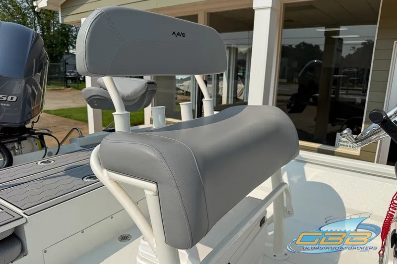 Slide: The Image of 2022 Avid 23 FS boat with gray seating and Yamaha 150 engine. - 19