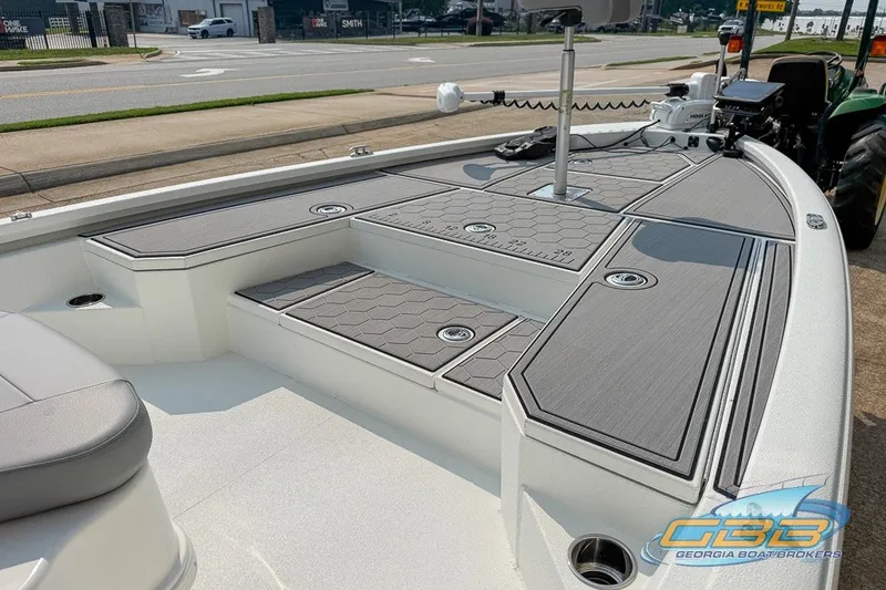 Slide: The Image of 2022 Avid 23 FS boat deck with sleek design and modern features, showcased by Georgia Boat Brokers. - 10