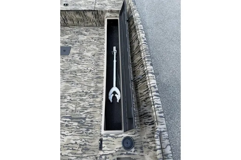 Slide: The Image of Camouflage-patterned Excel 183 Tomahawk boat storage compartment with anchor, 2027 model. - 17