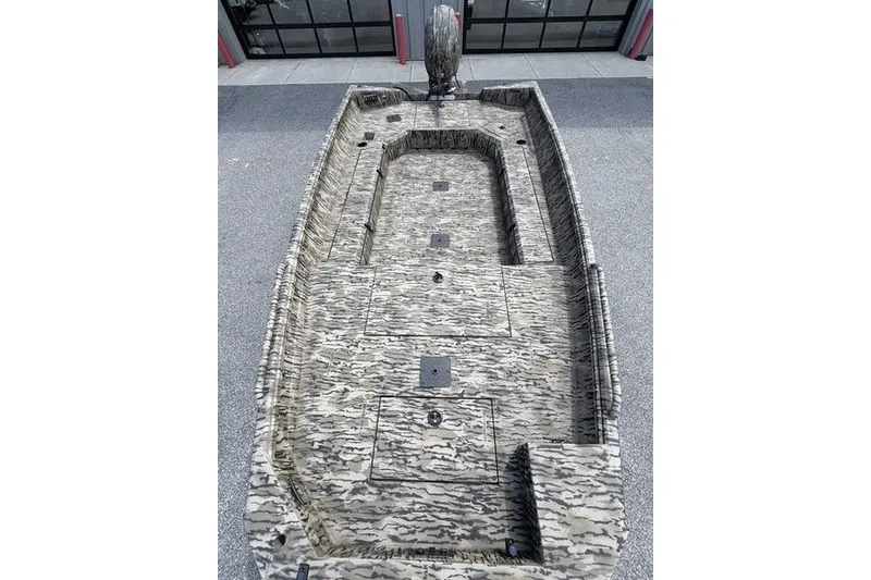 Slide: The Image of 2027 Excel 183 Tomahawk boat with camouflage design, viewed from above. - 9