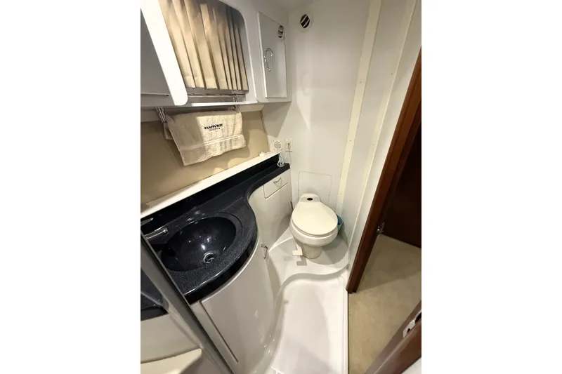 Slide: The Image of Bathroom interior of 2003 Carver 366 Motor Yacht with sink and toilet. - 20